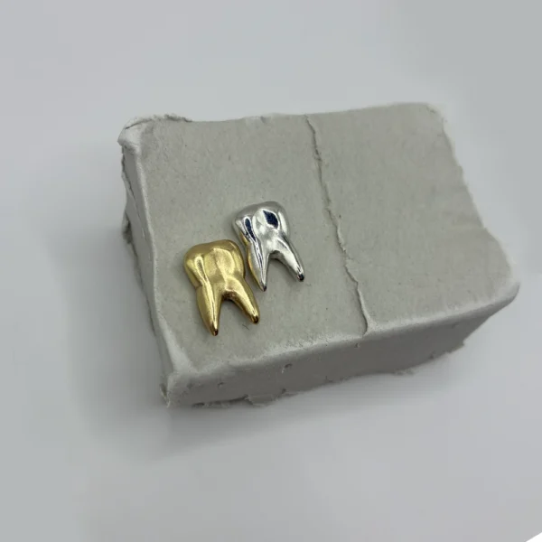 Bite Sisters earrings in silver and bronze, preview image