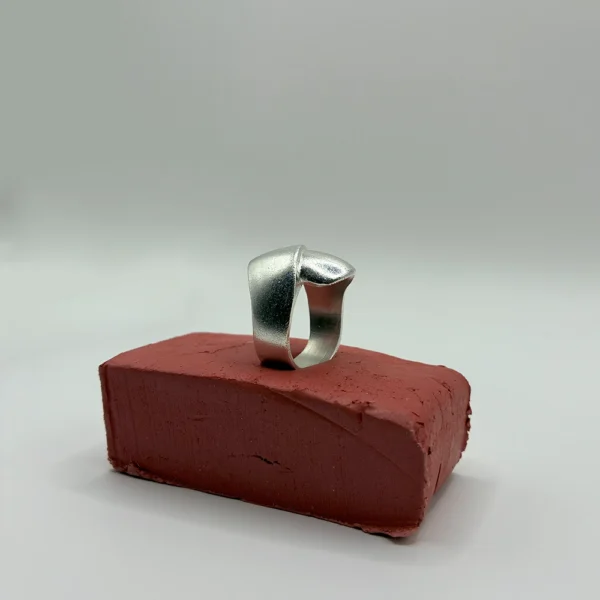 Close-up of Kissed Edges ring in silver